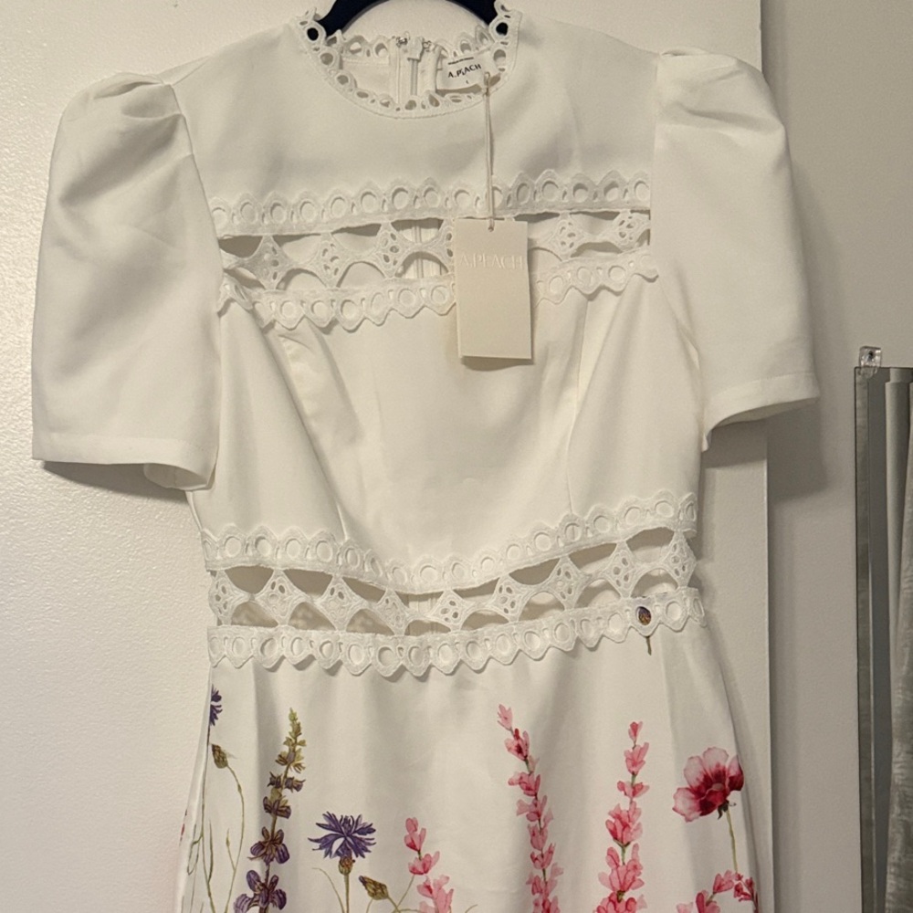 White Dress with Vibrant Floral Accents